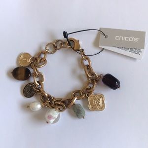 Chico's gold charm bracelet; chain link with 8 small charms